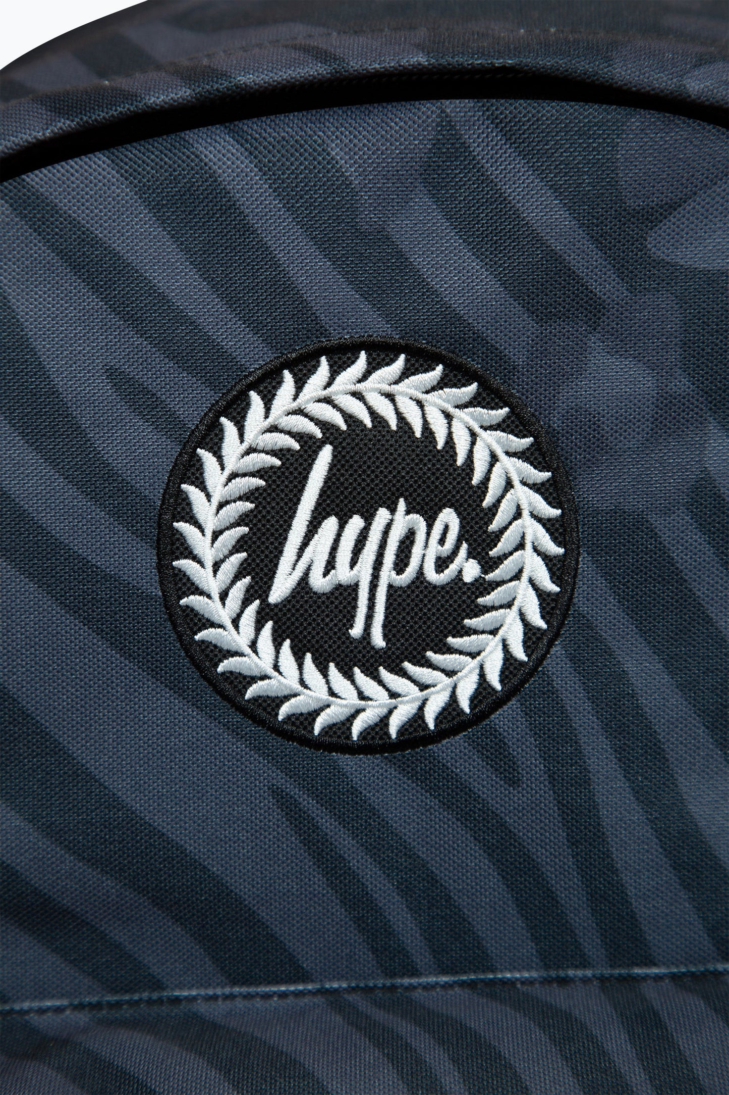 HYPE UNISEX BLACK ANIMAL PRINT BADGE BACKPACK