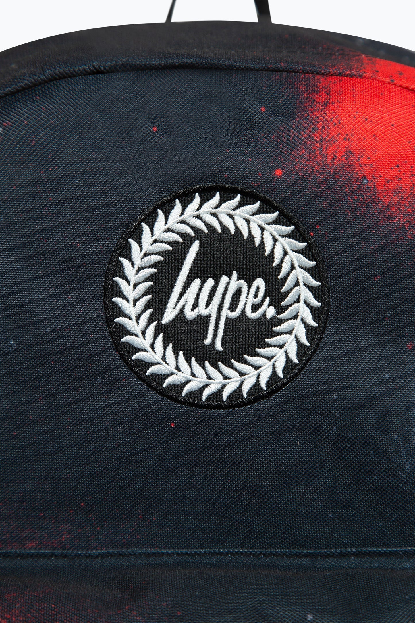 HYPE RED/WHITE SPRAY BADGE BACKPACK