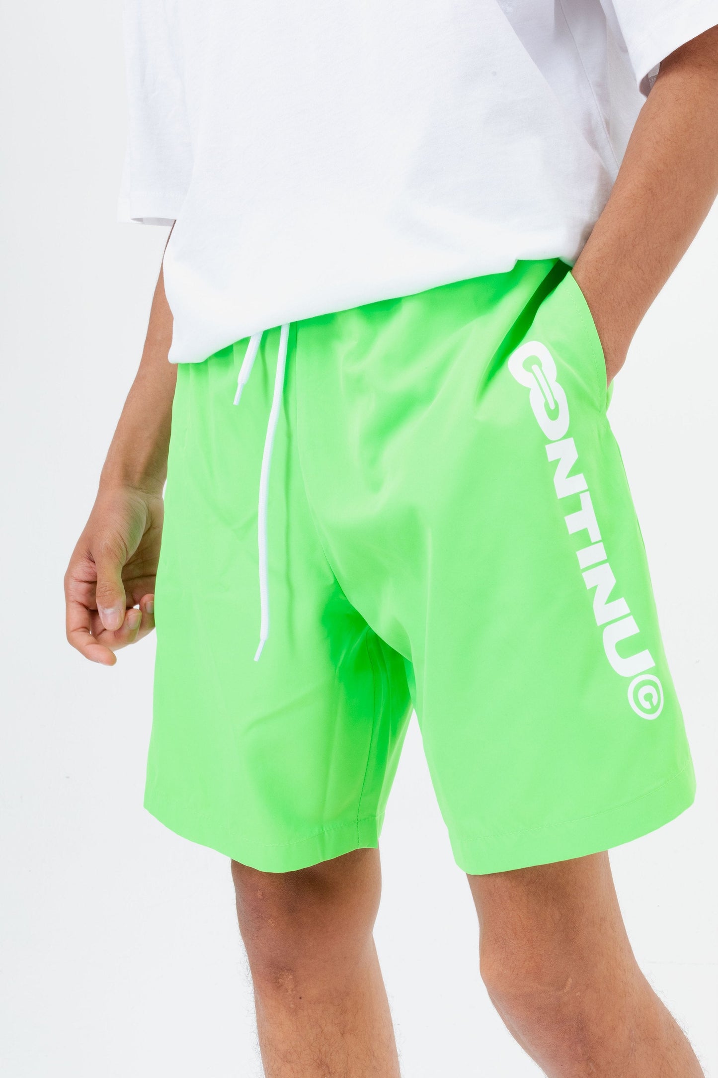 CONTINU8 GREEN SWIM SHORTS