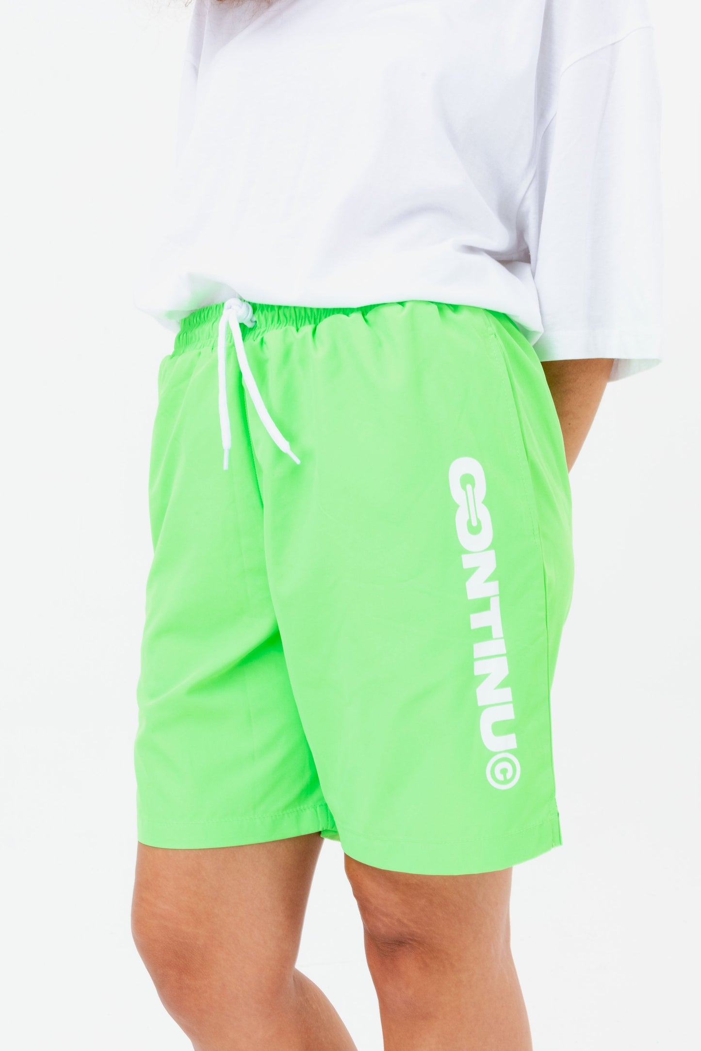 CONTINU8 GREEN SWIM SHORTS