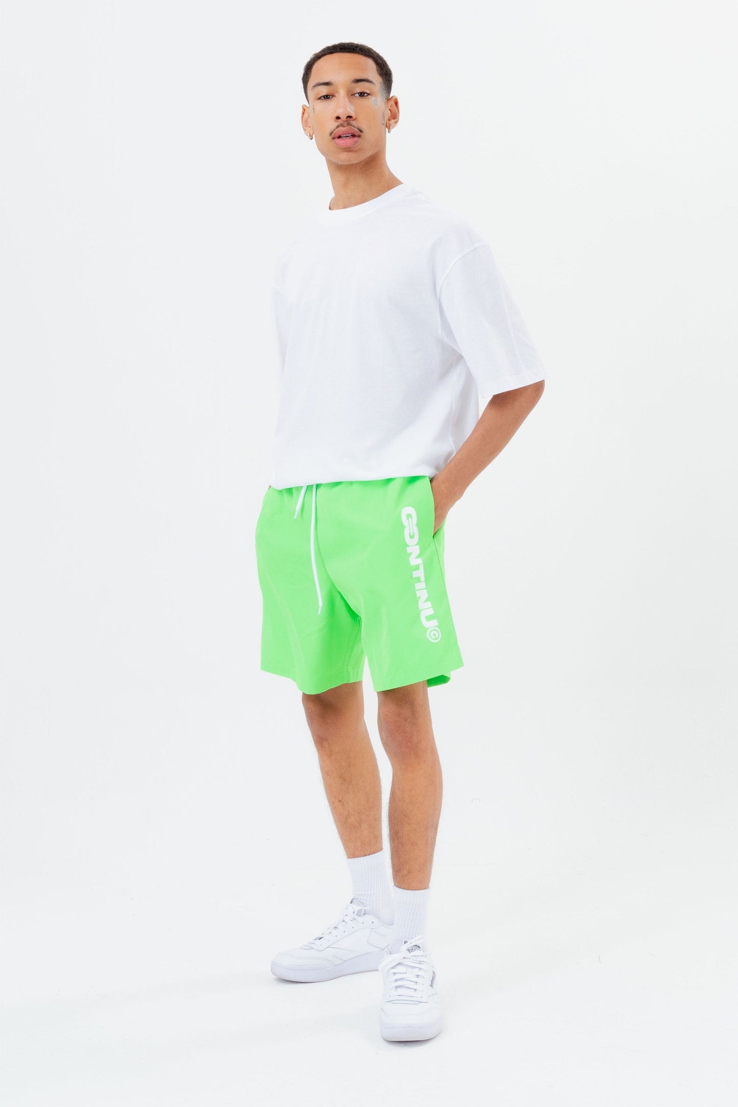 CONTINU8 GREEN SWIM SHORTS