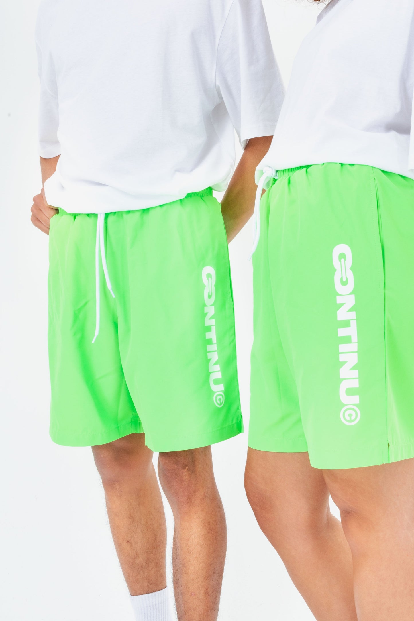 CONTINU8 GREEN SWIM SHORTS