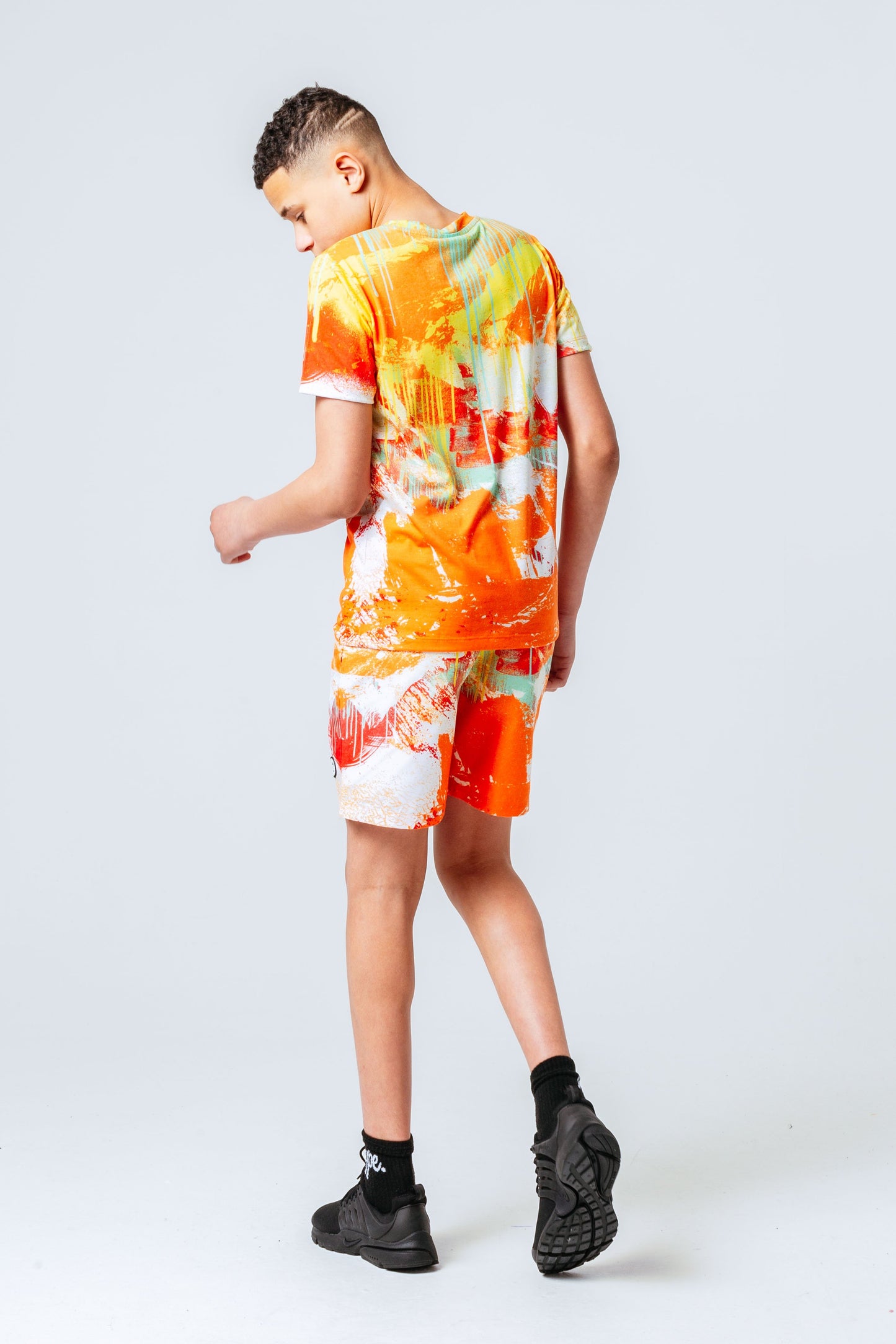 HYPE ORANGE SPRAY KIDS SWIM SHORTS