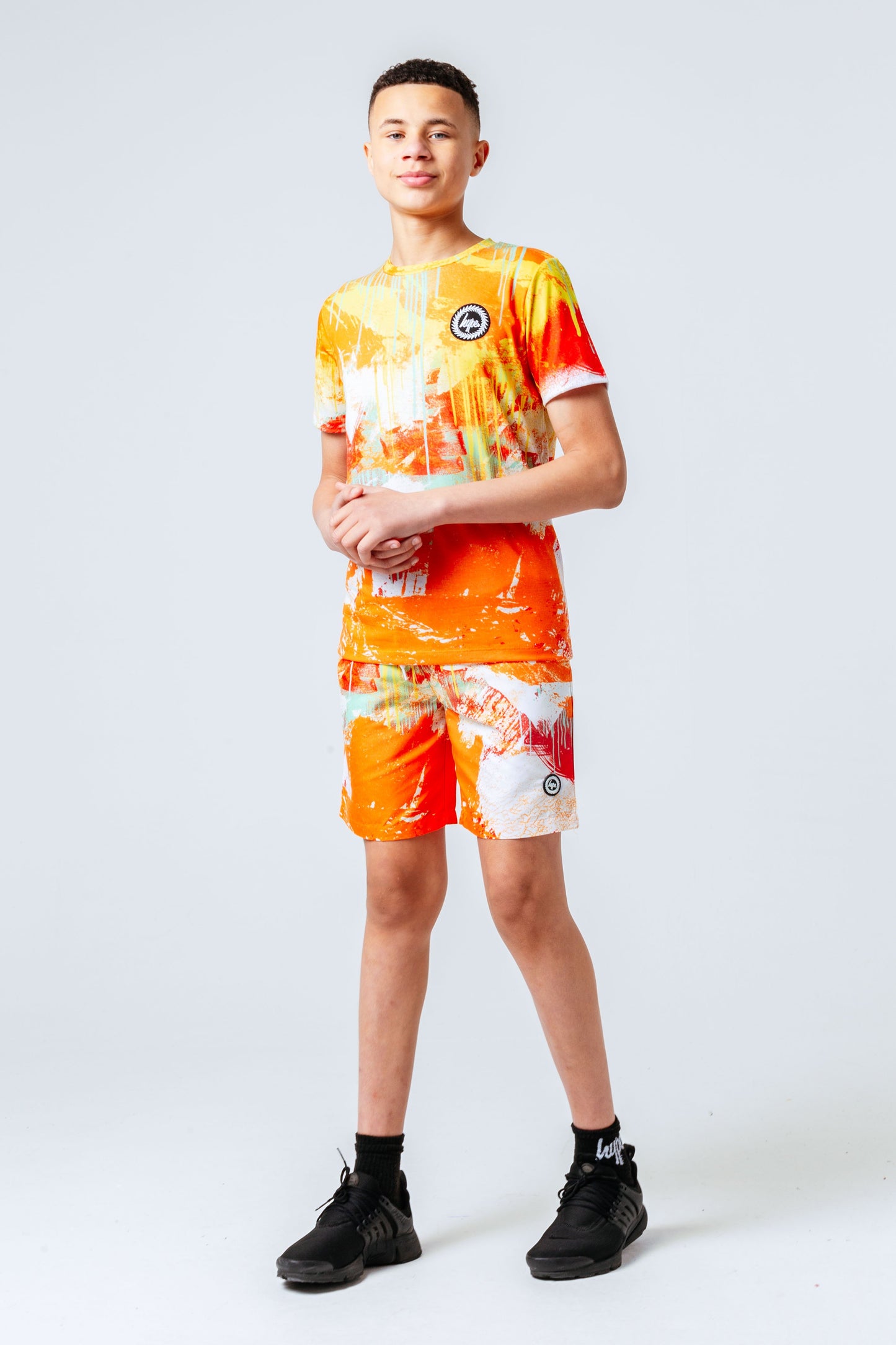 HYPE ORANGE SPRAY KIDS SWIM SHORTS